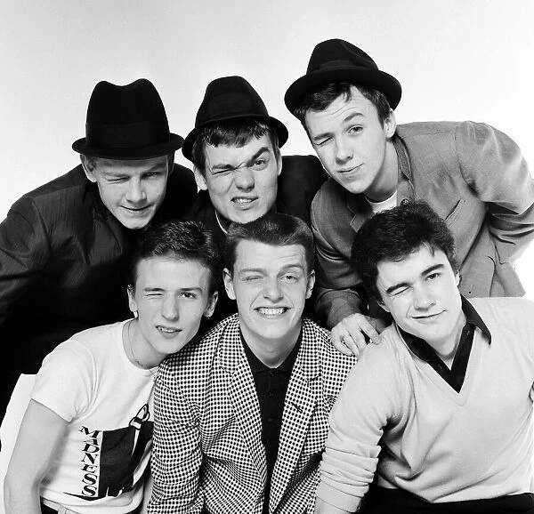 Pop group Madness pose in the Daily Mirror Studio, minus member Lee Thompson