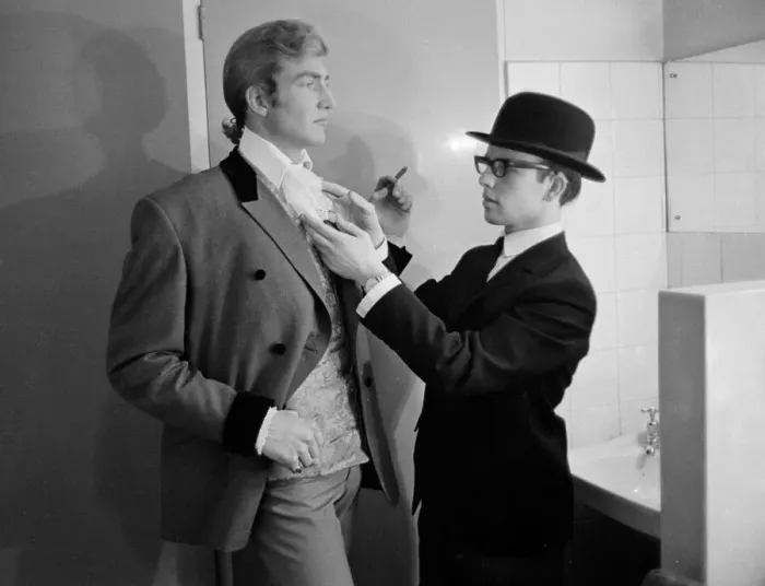Framed Print : Pop singer Beau Brummel receives a helping hand with his cravatte from his valet Jeffers Framed Print : Pop singer Beau Brummel receives a helping hand with his cravatte from his valet Jeffers
