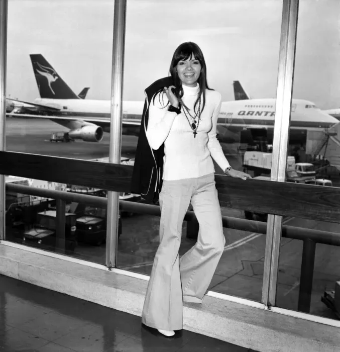Framed Print : Pop singer Eve Graham. Singer Eve Graham left Heathrow Airport today for Los Angeles