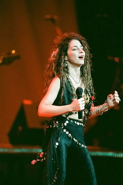 Pop singer Gloria Estefan performing on stage during a concert in Britain 24th