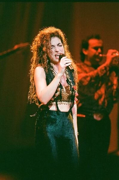 Pop singer Gloria Estefan performing on stage during a concert in Britain 24th