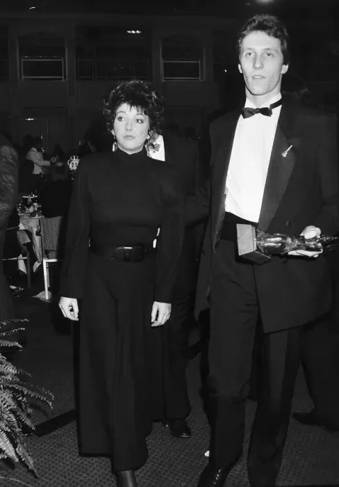 Framed Print : Pop singer Kate Bush arrives at an award ceremony in London with A mystery man