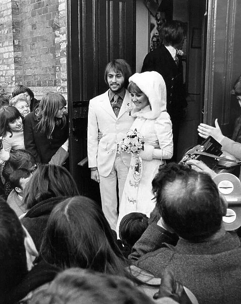 Pop singer Lulu waring a victorian style outfit was married to Maurice Gibb of the Bee