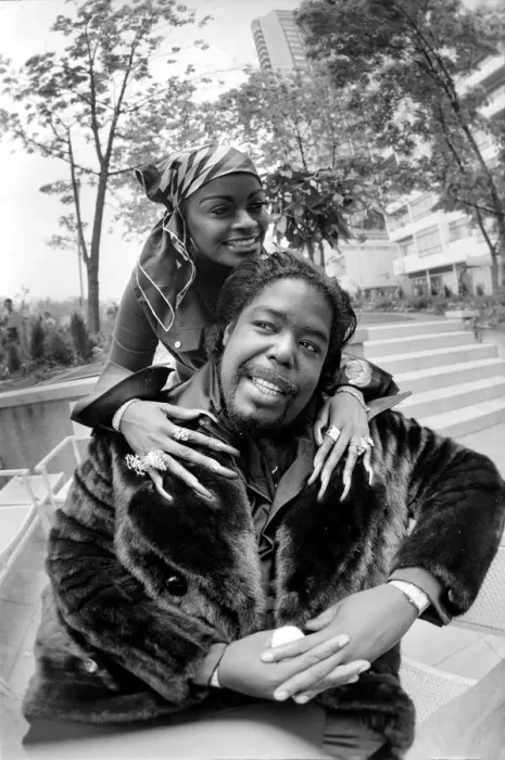 Framed Print : Pop star Barry White with his wife Goldean displaying her affections