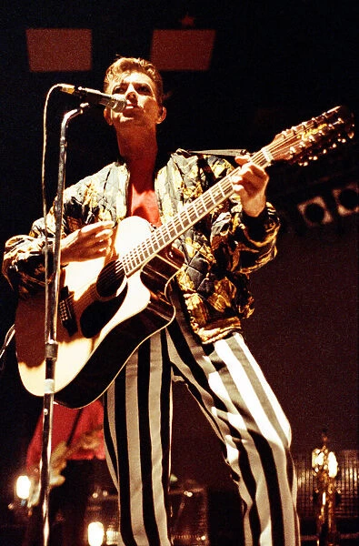 Pop star David Bowie performing on stage during a concert at the Barrowlands in Glasgow