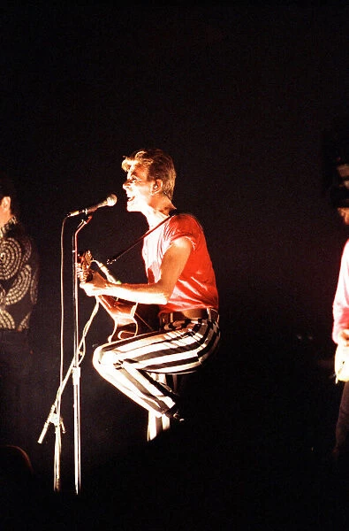 Pop star David Bowie performing on stage during a concert at the Barrowlands in Glasgow