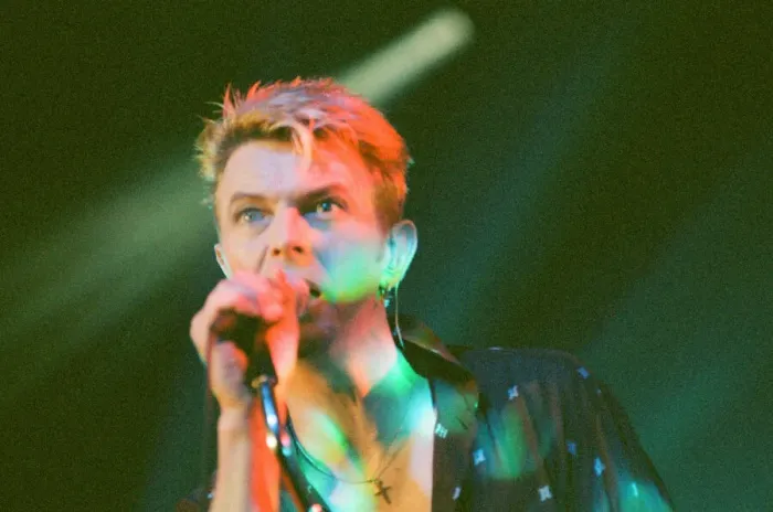 Framed Print : Pop star David Bowie performing on stage during a concert at The Barrowlands in Glasgow