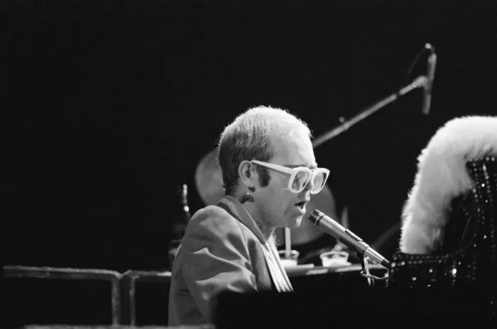 Framed Print : Pop star Elton John on stage at Earls Court, London. This is his first London concert