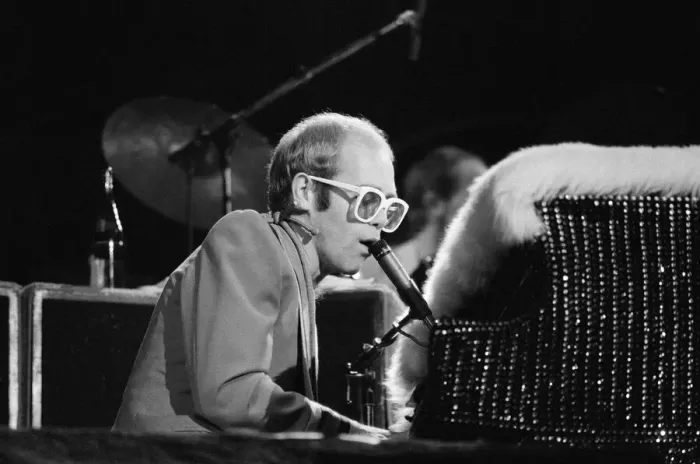 Framed Print : Pop star Elton John on stage at Earls Court, London. This is his first London concert