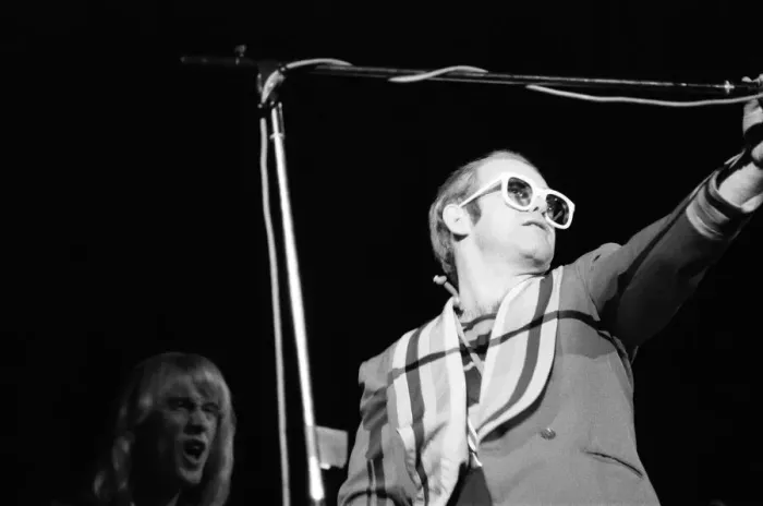 Framed Print : Pop star Elton John on stage at Earls Court, London. This is his first London concert Framed Print : Pop star Elton John on stage at Earls Court, London. This is his first London concert
