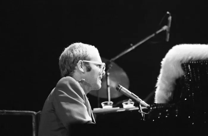 Framed Print : Pop star Elton John on stage at Earls Court, London. This is his first London concert Framed Print : Pop star Elton John on stage at Earls Court, London. This is his first London concert