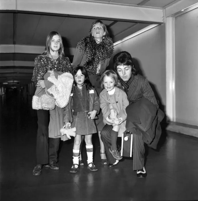 Framed Print : Pop star Paul McCartney and family. Carrying a portable radio Framed Print : Pop star Paul McCartney and family. Carrying a portable radio