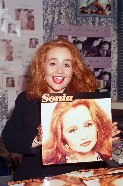 Pop star Sonia signing copies of her album Sonia in Reading. 8th October 1991