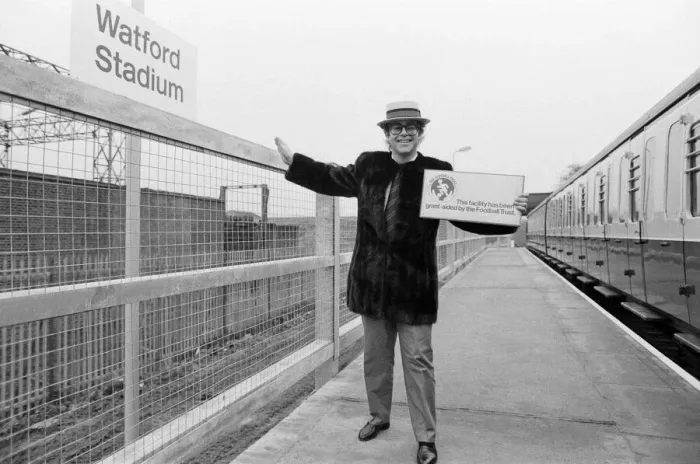 Framed Print : Pop star and Watford FC Chairman, Elton John, opens the new Watford Stadium Halt railway Framed Print : Pop star and Watford FC Chairman, Elton John, opens the new Watford Stadium Halt railway