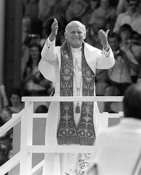 Pope John Paul II blesses the crowd during his visit to Cardiff