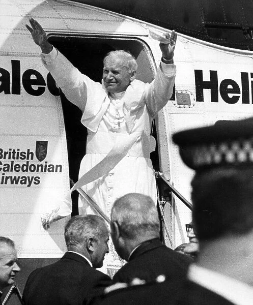 Pope John Paull IIs visit to Coventry. The Holy Father steps out of the helicopter