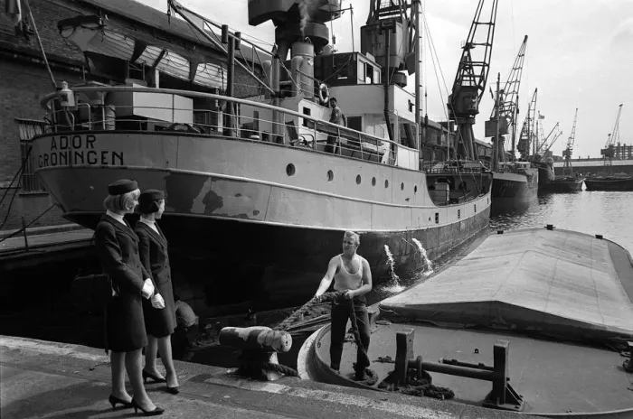Framed Print : Port of London Dock Guides, June 1965. Two of the guides talk with a boatman Framed Print : Port of London Dock Guides, June 1965. Two of the guides talk with a boatman