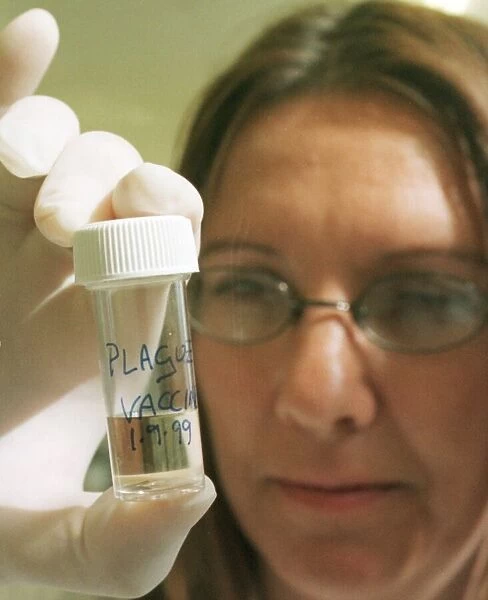 Porton Down September 1999 Scientist holding Vial of Plague Vaccine in Building 422 -