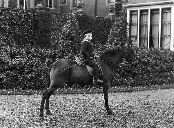 Portrait of the then Duke of York, later to be King George VI on horseback. 1902