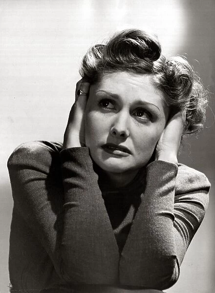 Portrait of a woman looking thoughtful December 1940