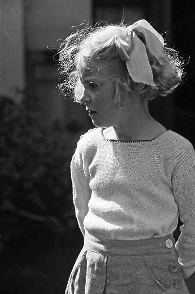 A portrait of a young girl, Ella Edwards. Circa 1942