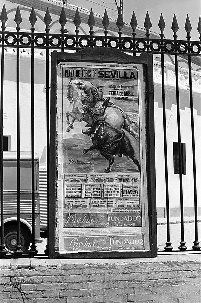 A poster advertising the Seville Fair. Seville, Spain. April 1966