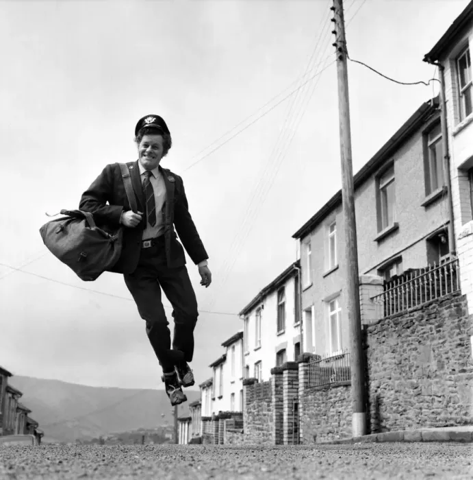 Framed Print : Postman Mr. Fred Henderson in happy mood as he delivers his mail. April 1975 Framed Print : Postman Mr. Fred Henderson in happy mood as he delivers his mail. April 1975