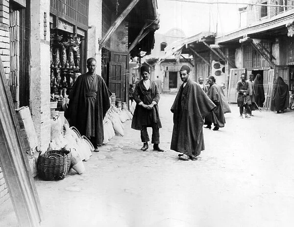 A potters shop in Hamadan, capital city of Hamadan Province of Iran. Circa 1926