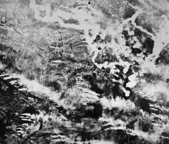 Framed Print : Pouring into swirling, billowing clouds of smoke rising from bomb battered Kiel