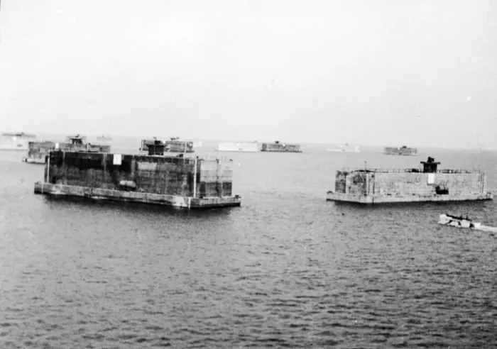Framed Print : Pre-fabricated ports set down at Mulberry Harbour off the coast of Normandy built to aid Framed Print : Pre-fabricated ports set down at Mulberry Harbour off the coast of Normandy built to aid