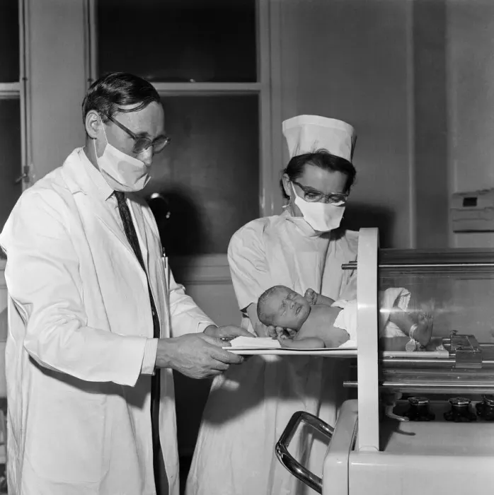 Framed Print : A premature baby in one of the machines that can save new born babies
