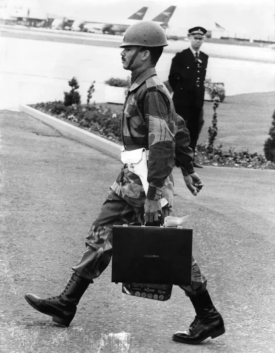 Framed Print : President Ali Bhutto of Pakistan arriving at Heathrow with his own bodyguard for an Framed Print : President Ali Bhutto of Pakistan arriving at Heathrow with his own bodyguard for an