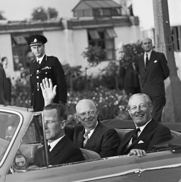 US President Eisenhower waves to the crowds at Heathrow Airport at the start of his visit
