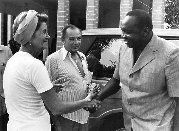 President Idi Amin talks to Americans Bob and Virginia Coder from Florida