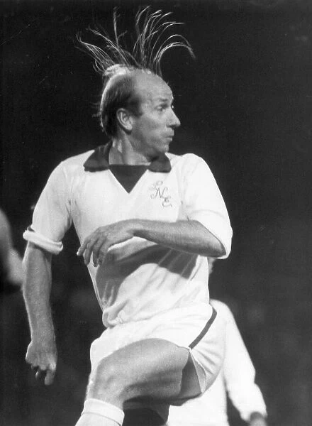 Preston North Ends player manager Bobby Charlton with his hair on end during a Third