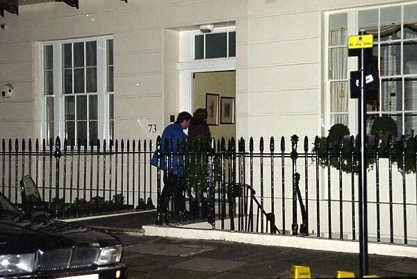 Former Prime Minister Baroness Thatcher with her husband Denis arrives at her four-storey