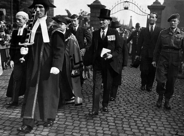 Prime Minister Clement Attlee MP leaving Warrington Parish Church in Lancashire