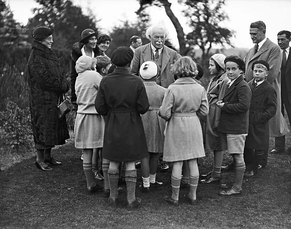 Former Prime Minister David Lloyd George, with Soviet children. Circa 1930
