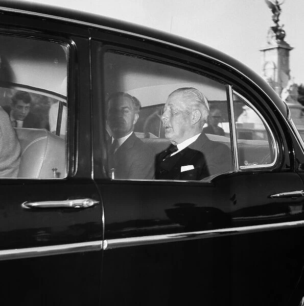 Prime Minister Harold Macmillan, pictured in a car, visiting Buckingham Palace