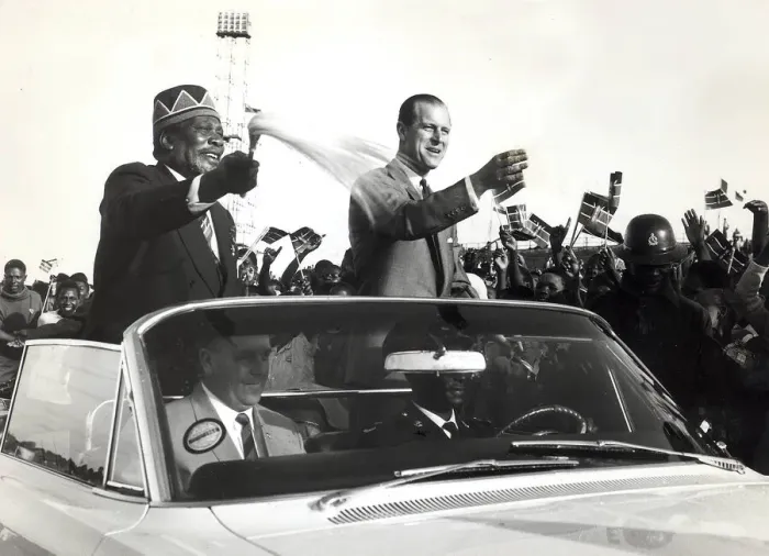 Framed Print : The Prime Minister of Kenya, Jomo Kenyatta drives through a crowd of people while Framed Print : The Prime Minister of Kenya, Jomo Kenyatta drives through a crowd of people while