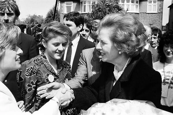 Prime Minister Margaret Thatcher campaigning in Ealing with Harry Greenway. 30th May 1987