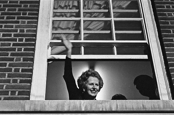 Prime Minister Margaret Thatcher celebrates at Conservative party headquarters after