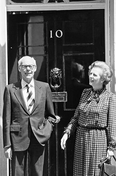 Prime Minister Margaret Thatcher and husband Denis on the steps of 10 Downing Street