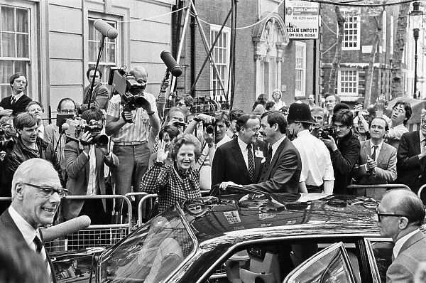 Prime Minister Margaret Thatcher and husband Denis emerge from Conservative Party