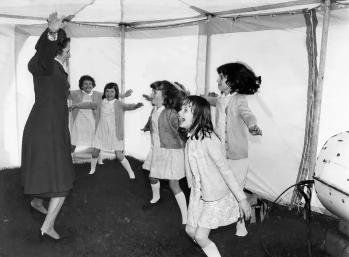 Framed Print : Prime Minister Margaret Thatcher seen here leading a group of children in a session of Framed Print : Prime Minister Margaret Thatcher seen here leading a group of children in a session of