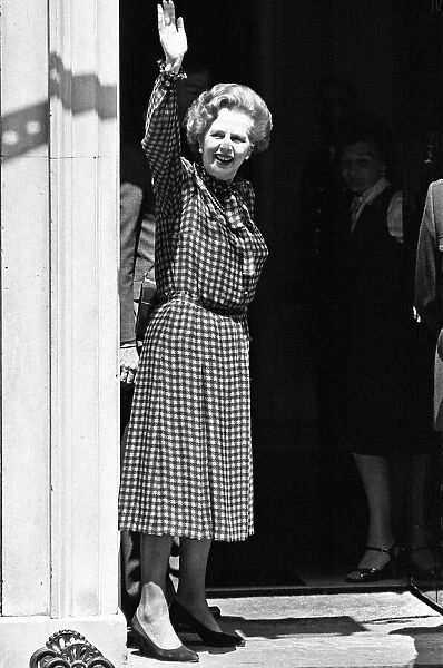 Prime Minister Margaret Thatcher on the steps of 10 Downing Street waving to the crowds