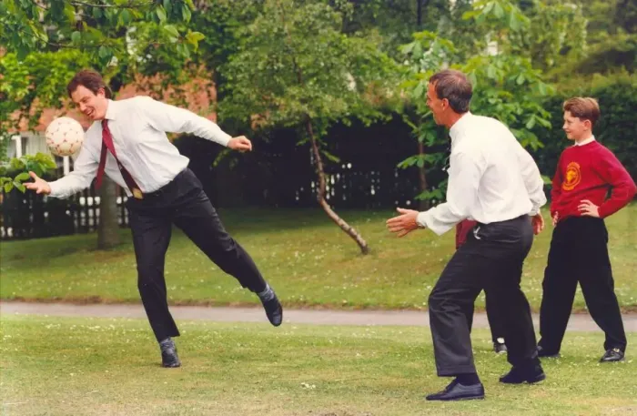 Framed Print : Prime Minister Tony Blair and ex FIFA football referee George Courtney play football Framed Print : Prime Minister Tony Blair and ex FIFA football referee George Courtney play football