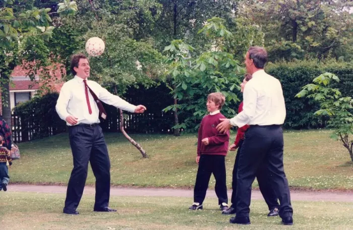 Framed Print : Prime Minister Tony Blair and ex FIFA football referee George Courtney play football Framed Print : Prime Minister Tony Blair and ex FIFA football referee George Courtney play football
