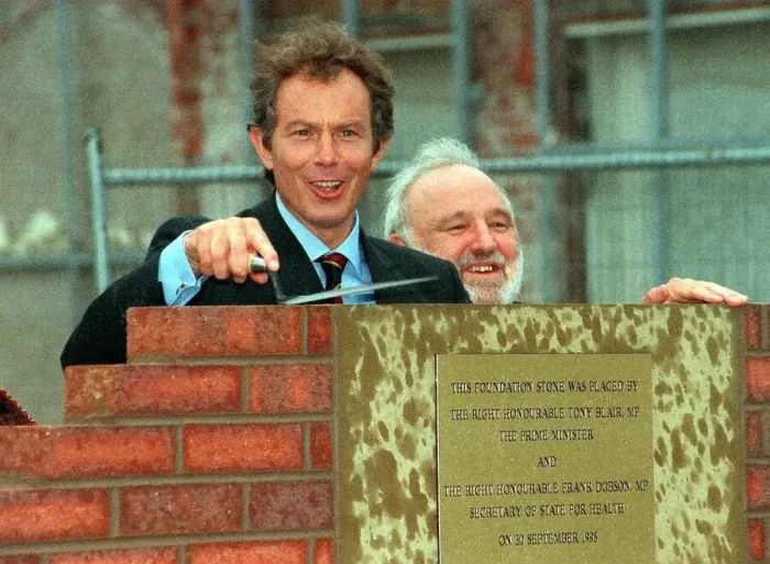 Framed Print : Prime Minister Tony Blair and Frank Dobson (only just) lay a foundation stone for new