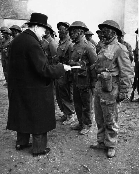 The Prime Minister Winston Churchill watched an exercise by troops on commando lines